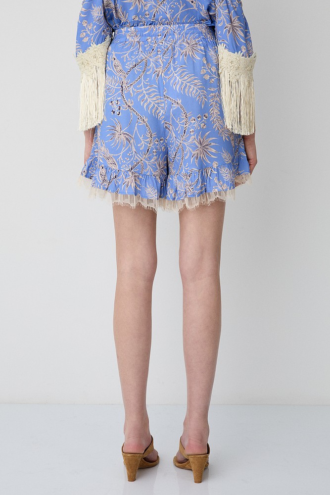 Shorts estampados con volantes