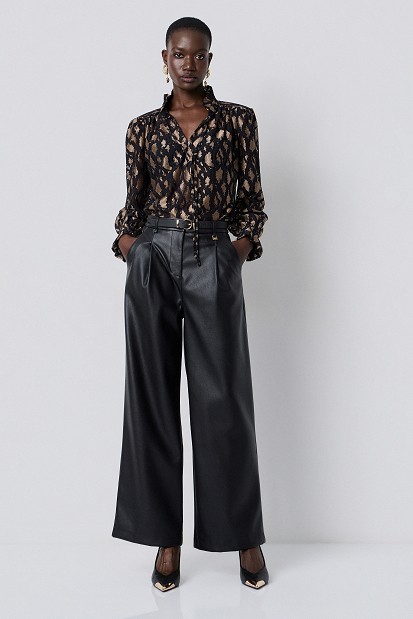 Animal-print blouse with lace and shoulder pads