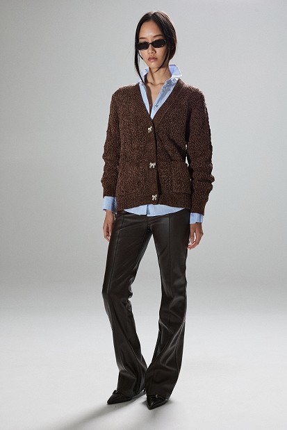 Leather-look flared trousers