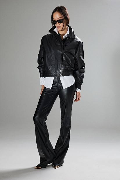 Leather-look flared trousers