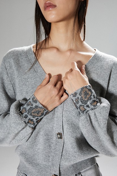 Knited cardigan with balloon sleeves and rhinestone embellishments