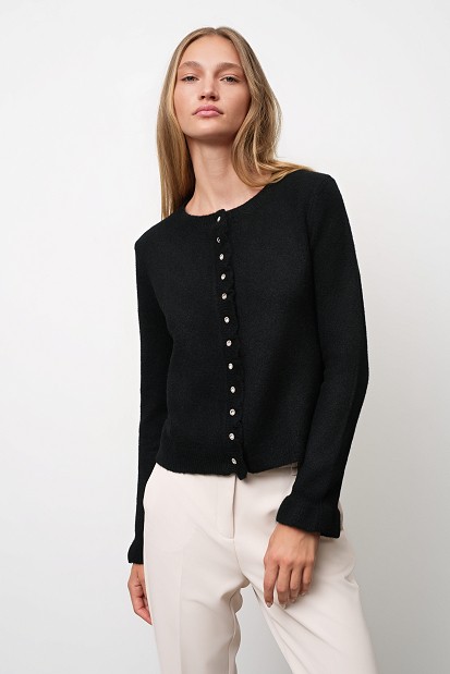 Knitted cardigan with jewel buttons and ruffles