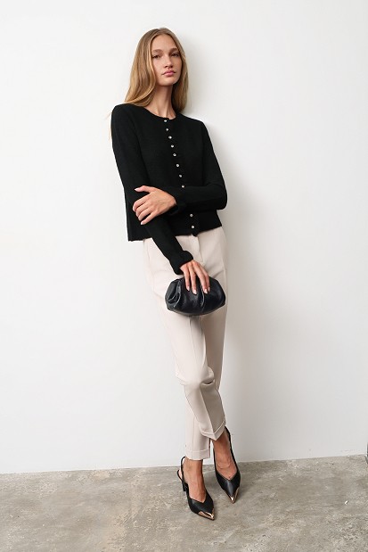 Knitted cardigan with jewel buttons and ruffles