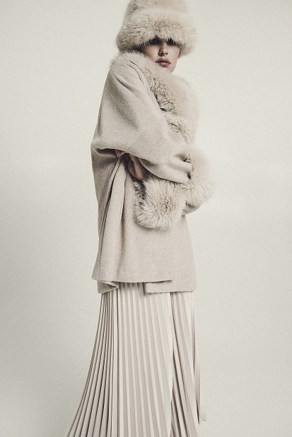 Faux fur coat with a belt