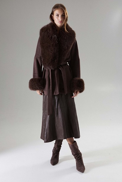 Faux fur coat with a belt