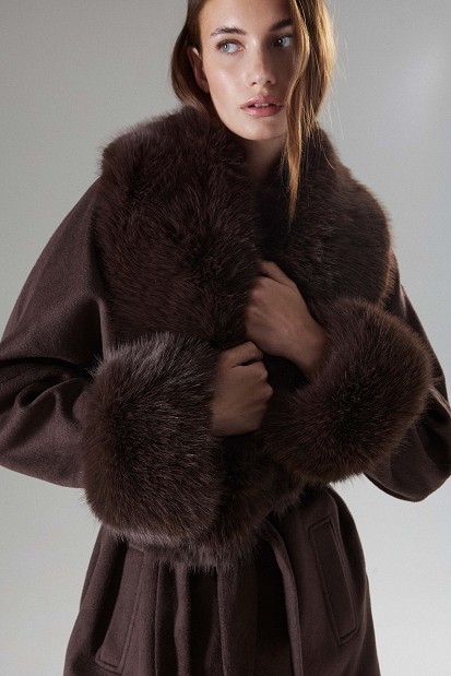 Faux fur coat with a belt