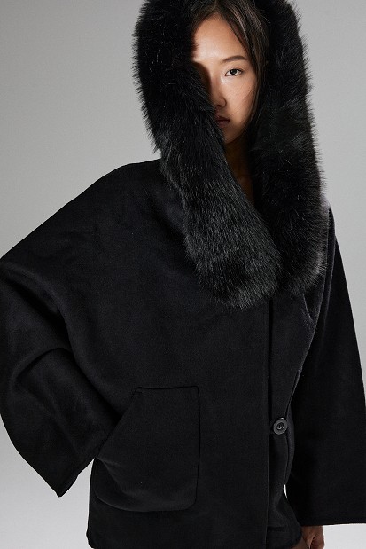 Coat with fur collar