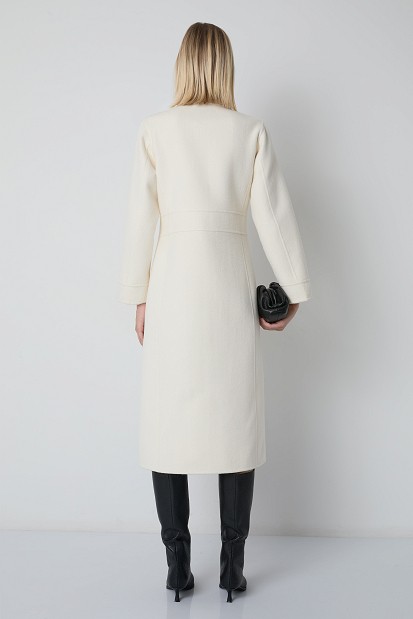 Long coat with a high collar and gold-tone buttons