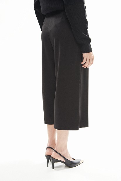Asymmetric pleated culotte trousers