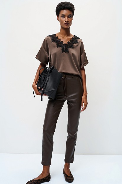 High-waisted leather-look trousers