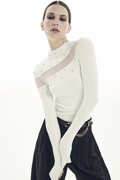 Knitted top with sheer detailing and rhinestone embellishments