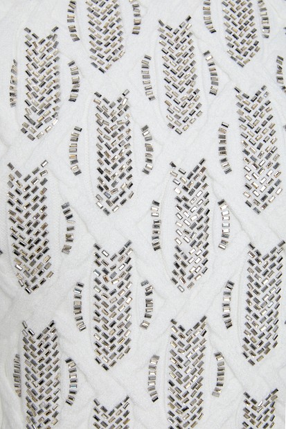 Sleeveless knitted sweater with rhinestones