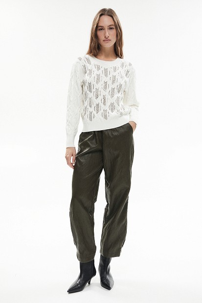 Knitted sweater with textured pattern and rhinestones