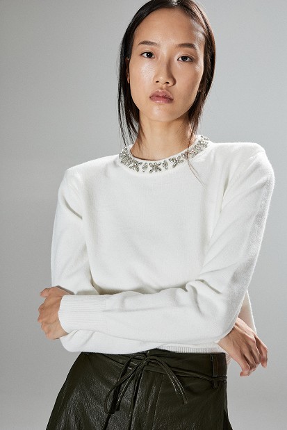 Embellished knit sweater with decorative stones