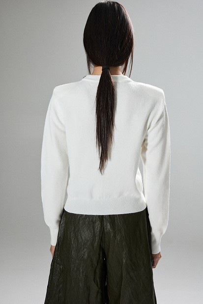 Embellished knit sweater with decorative stones