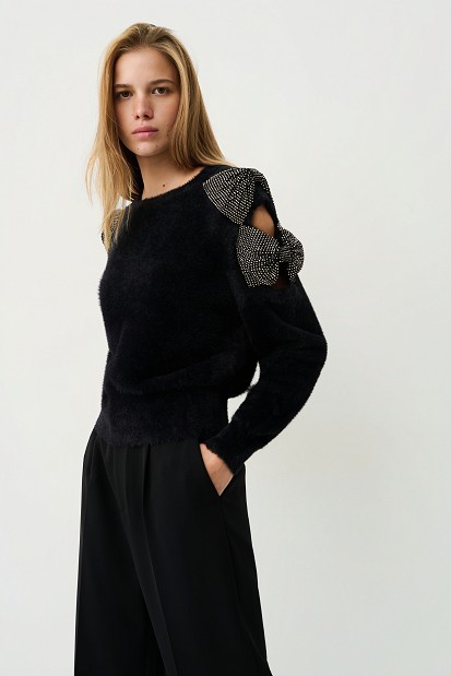Sweater with bow and rhinestone embellished sleeves