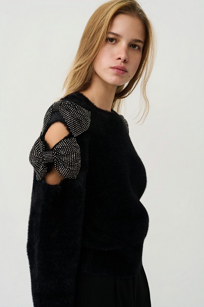 Sweater with bow and rhinestone embellished sleeves