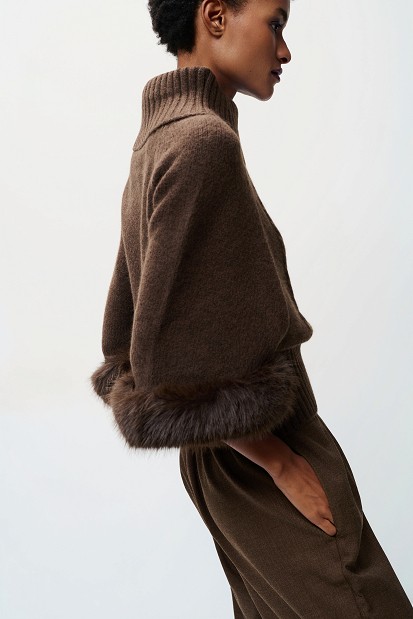 Turtleneck sweater with faux fur sleeves
