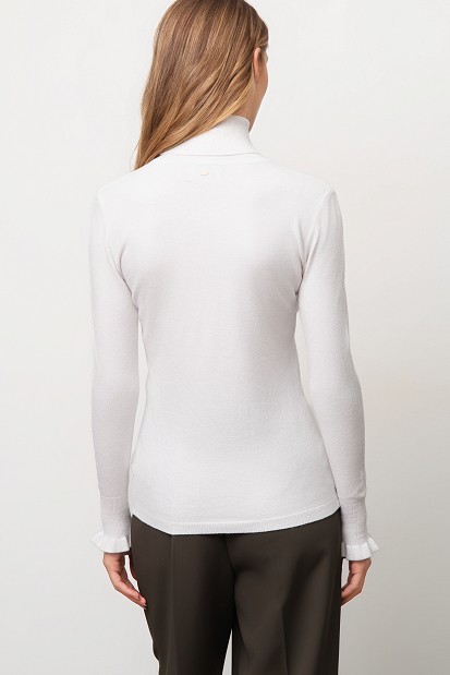 Basic turtleneck with ruffle sleeve details
