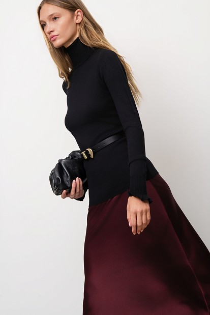 Basic turtleneck with ruffle sleeve details