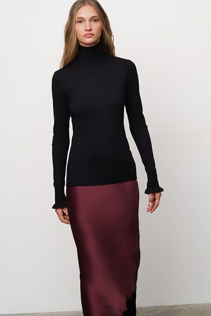 Basic turtleneck with ruffle sleeve details
