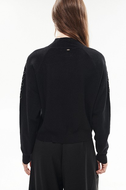 Knitted blouse with embroidered sleeve details