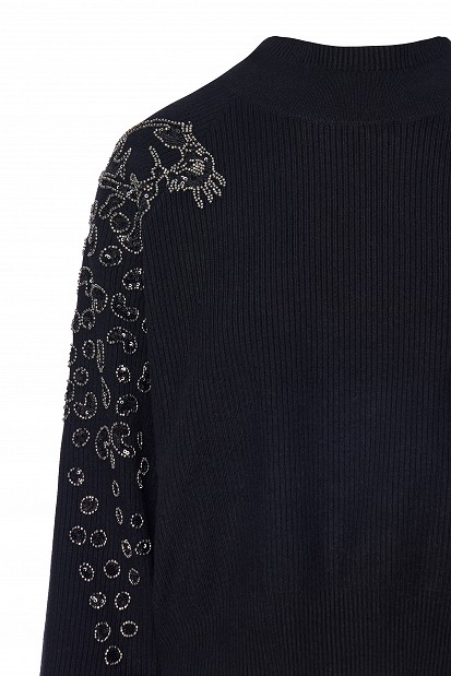 Knitted blouse with embroidered sleeve details
