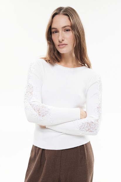 Knitted blouse with rhinestones and lace sleeves