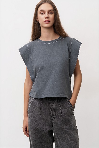 Sleeveless cotton top with ruffles