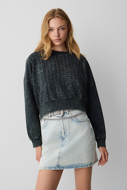 Sweatshirt with rhinestone embellishments
