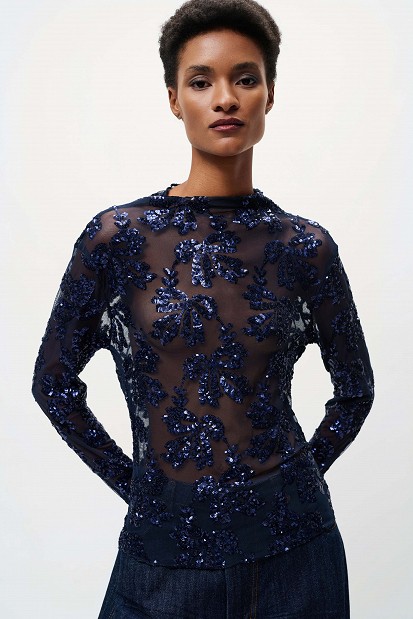 Sheer top with sequin embellishments
