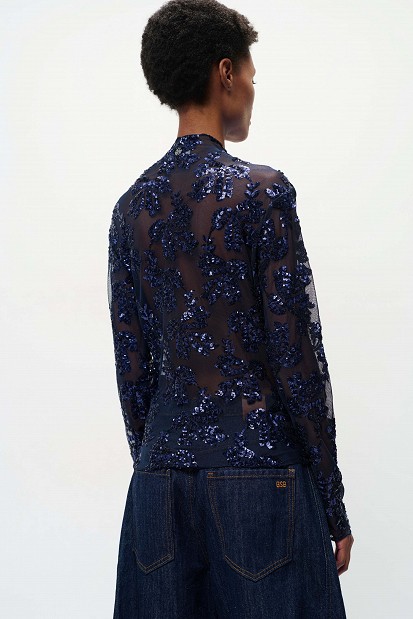 Sheer top with sequin embellishments
