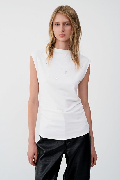 Sleeveless top with rhinestone embellishments