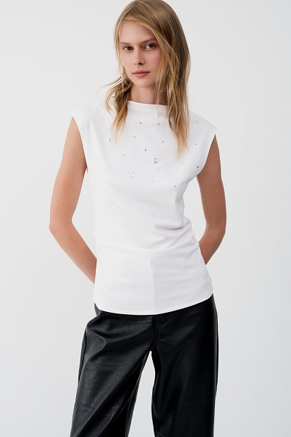 Sleeveless top with rhinestone embellishments