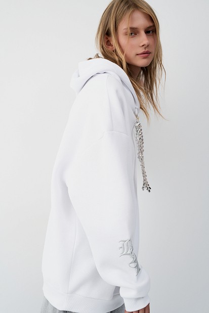 Hooded sweatshirt with rhinestone drawstrings