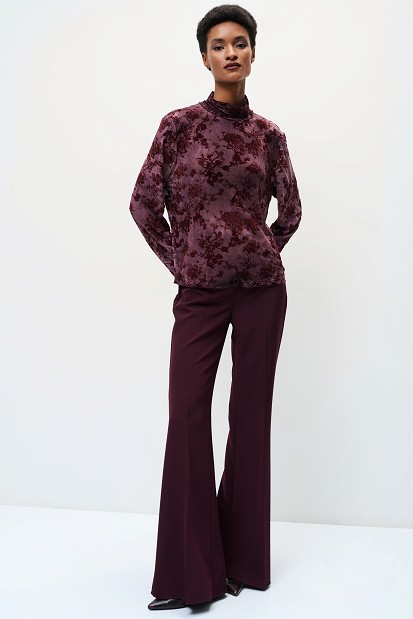 Sheer top with raised floral details