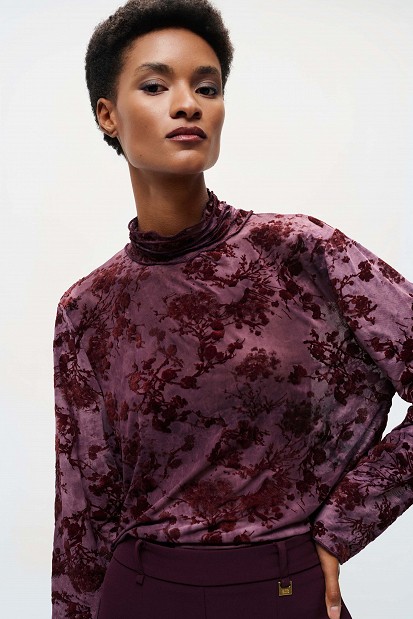 Sheer top with raised floral details