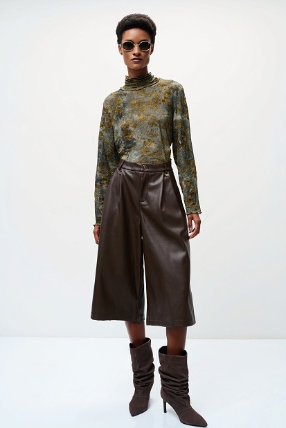 Sheer top with raised floral details