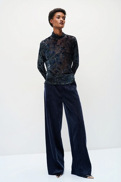 Sheer top with raised floral details