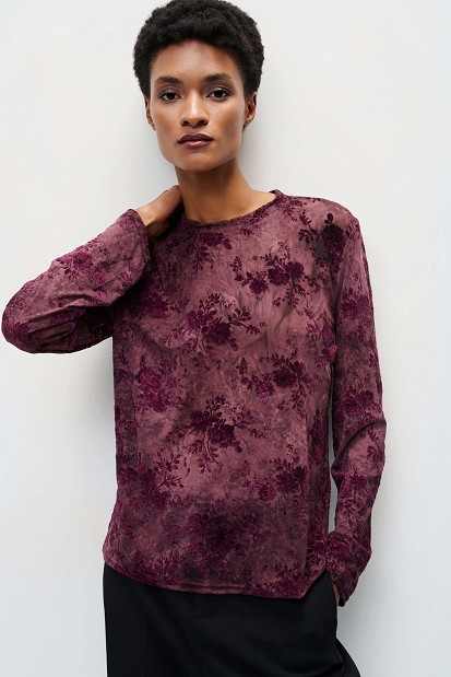 Sheer top with raised floral details