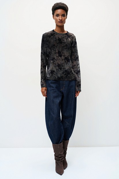Sheer top with raised floral details