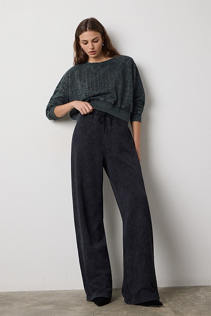 Sweatpants with rhinestone embellishments