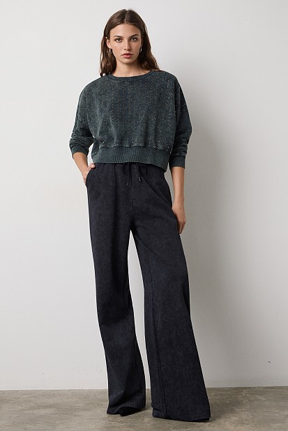 Sweatpants with rhinestone embellishments