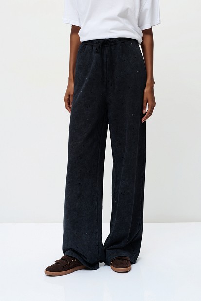 Sweatpants with rhinestone embellishments