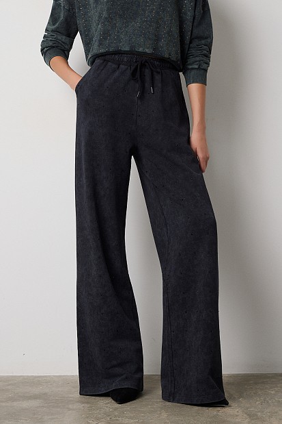 Sweatpants with rhinestone embellishments