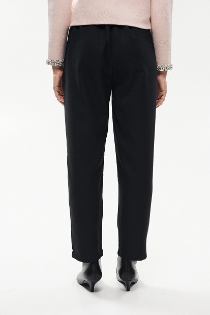 High-waisted pleated trousers