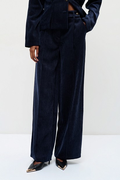 Pleated velvet-look trousers