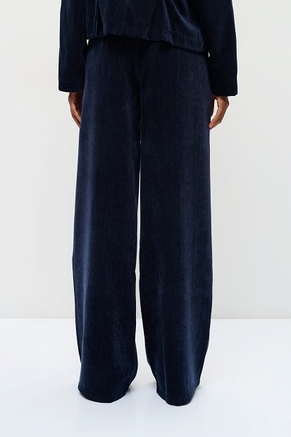Pleated velvet-look trousers