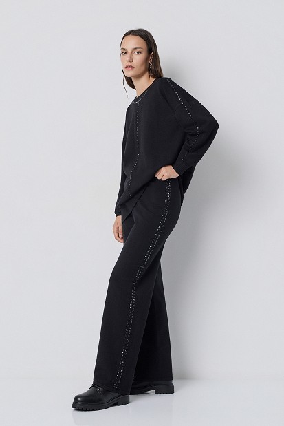 Pantaloni din tricot cu pietricele în lateral