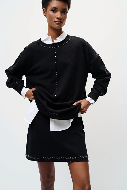Mini knitted skirt with rhinestone embellishments